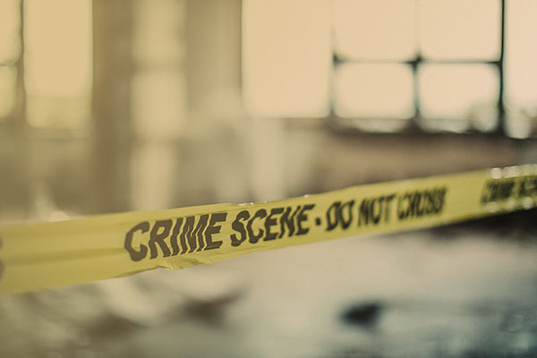 yellow tape marking off a crime scene